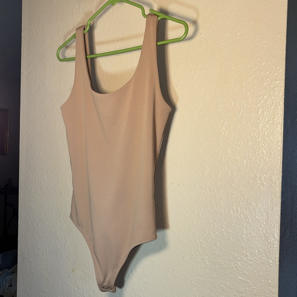 Express Body Contour Nude Sleeveless Low Back Bodysuit Size S. EUC